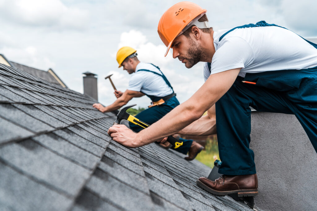 Roofers working on a new roof installation